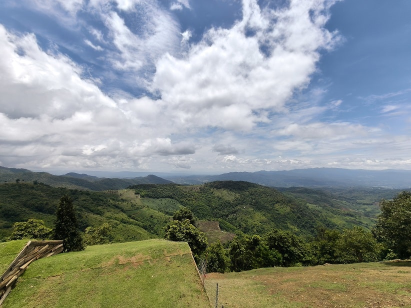 Blue Sky and Mountain Views Bright blue sky and green mountains at Akha FarmVille Chiang Rai