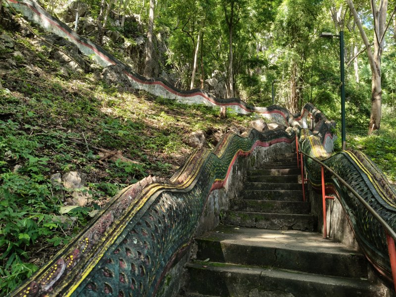 Climbing the Staircase to Muang On Cave Climbing the Staircase to Muang On Cave