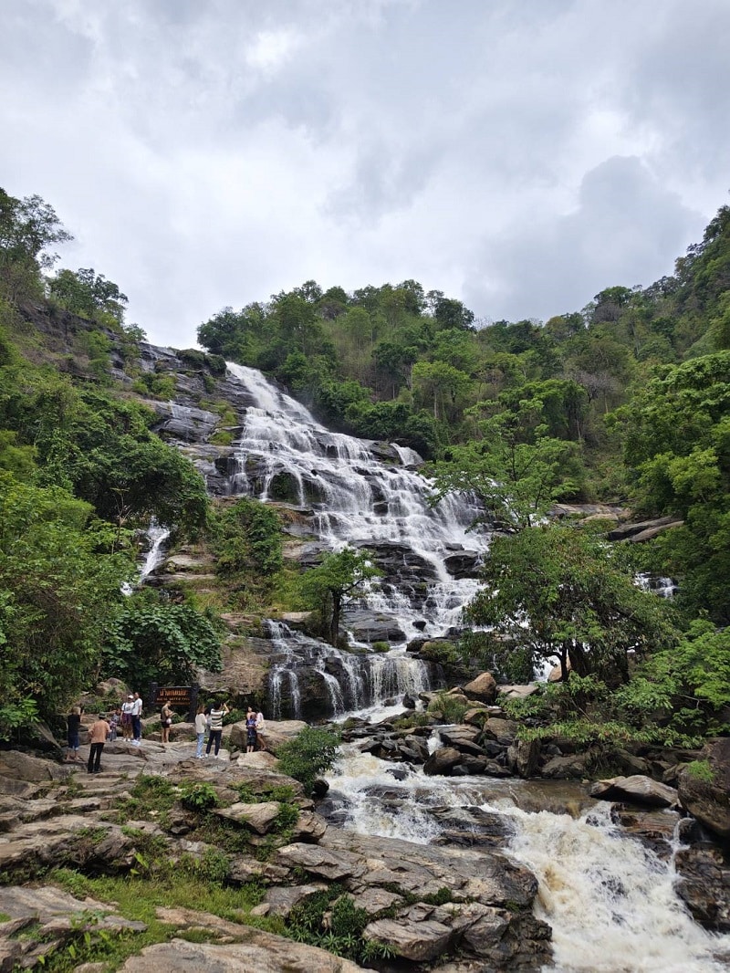 Mae Ya Waterfall surrounded by lush rainforest in Doi Inthanon Multi-Tiered Mae Ya Waterfall