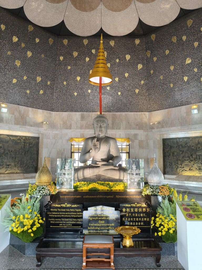 Spiritual atmosphere in the cool mountains of Chiang Mai. Peaceful Buddha statue inside the royal pagoda on Doi Inthanon.
