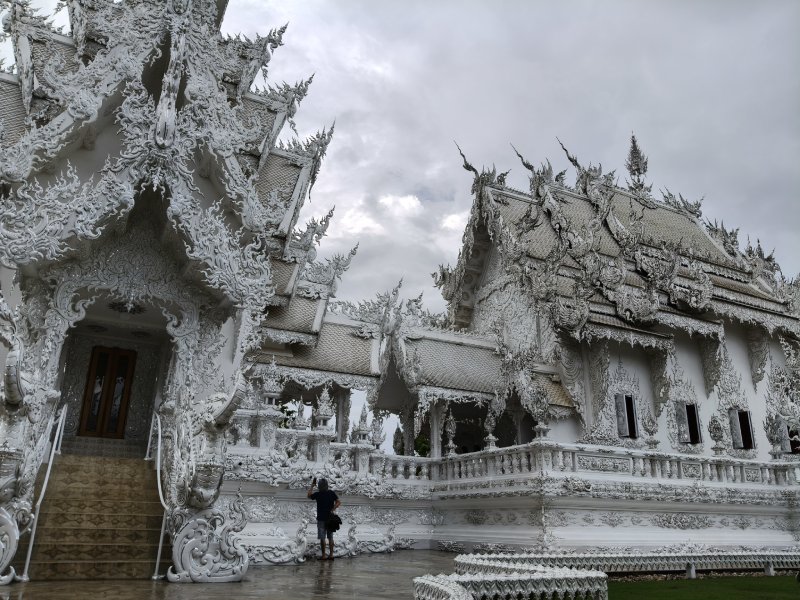 Famous Wat Rong Khun White Temple in Northern Thailand White Temple bridge and Buddhist architecture Chiang Rai