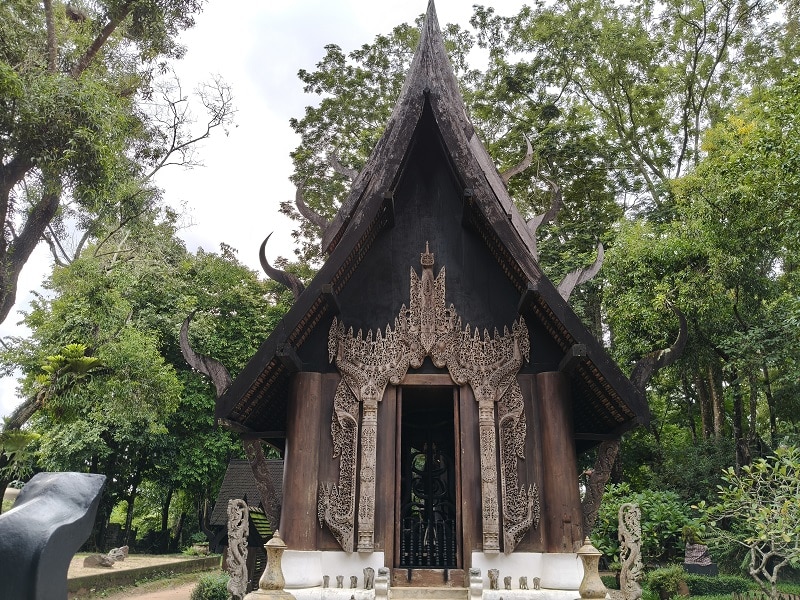 Panoramic view of Baan Dam Museum Black House complex in Chiang Rai Thailand