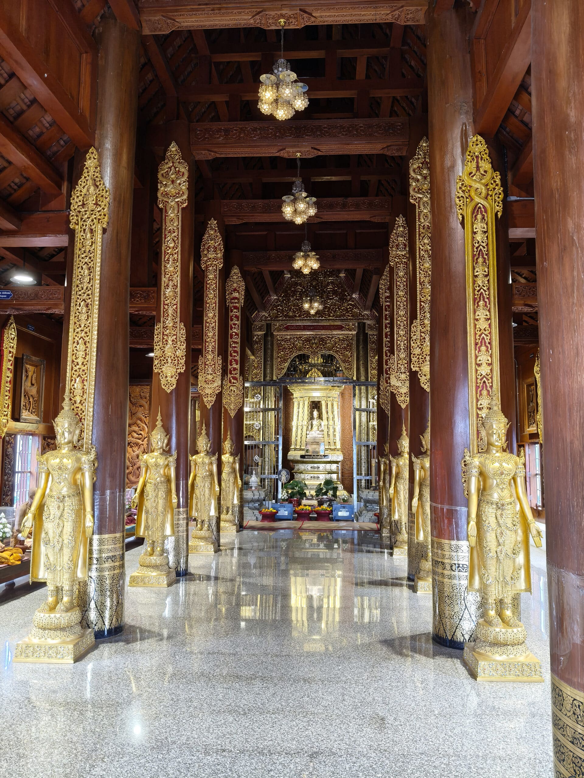 Colorful temple buildings at Wat Ban Den Colorful temple buildings at Wat Ban Den under blue sky near Chiang Mai