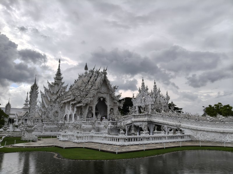 Wat Rong Khun White Temple Entrance Beautiful white architecture at Wat Rong Khun Chiang Rai